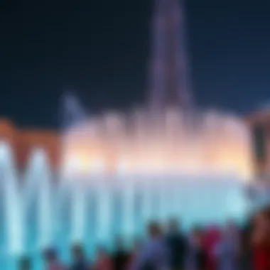 Audience Enjoying the Fountain Show Crowd gathered to watch the Dubai Fountain show with the Burj Khalifa in the background